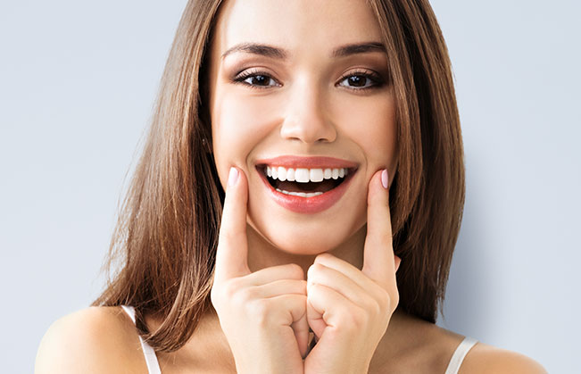 Woman showing off her beautiful smile