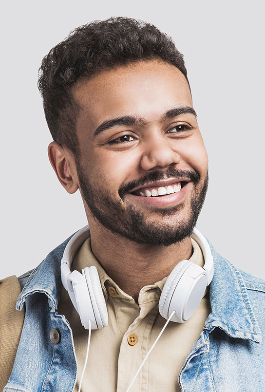 Man sharing smile after dental crowns and bridges