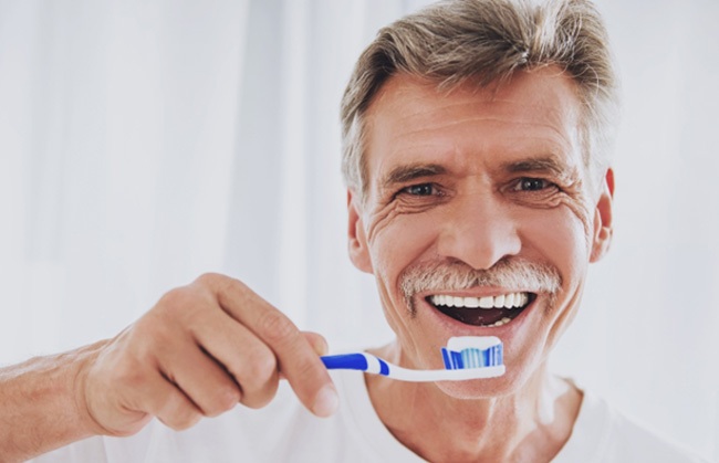 Man brushing his teeth