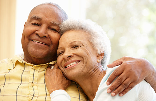Smiling couple with dentures