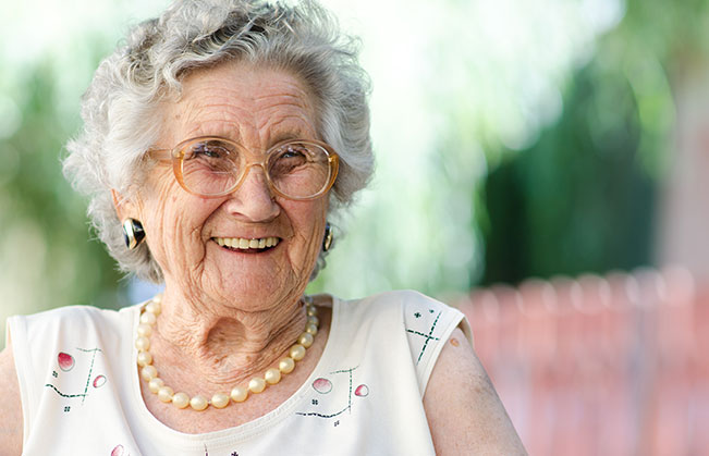Laughing woman with dentures