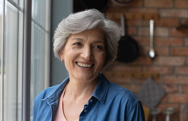 Woman with dentures smiling