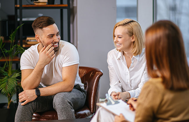 Group discussing dental implant dentures