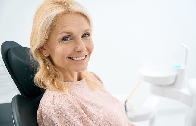 Woman smiling in the dental chair