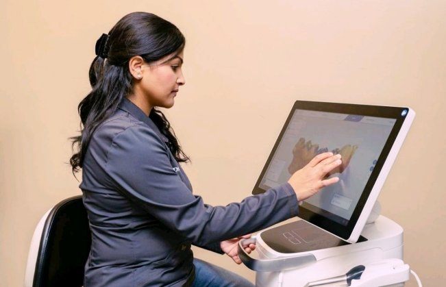 Doctor Kaur using digital impression system
