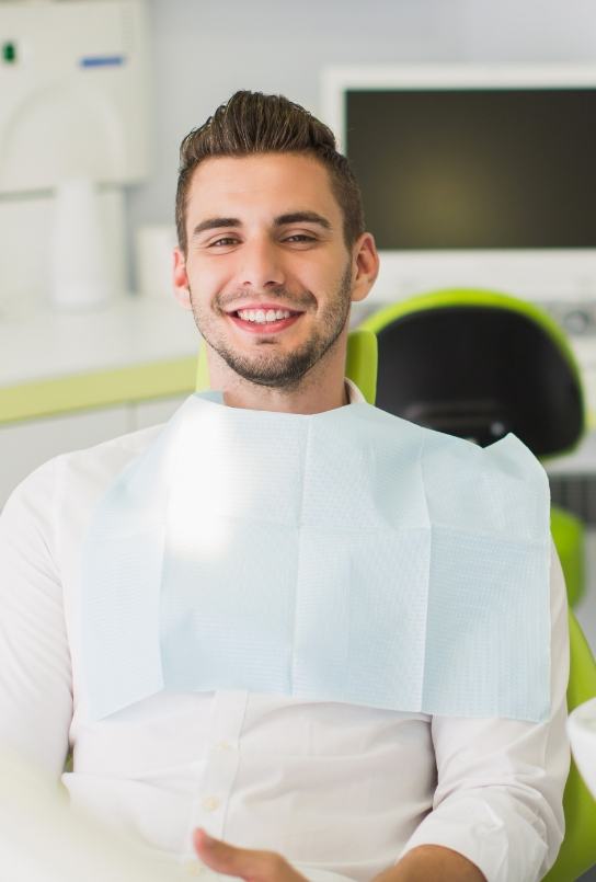 Man smiling during preventive dentistry visit