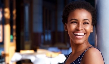 Woman smiling after cosmetic dentistry