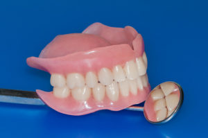Dentures and dental mirror