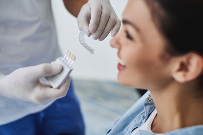 A woman learning how to prepare for Invisalign